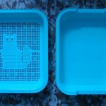 A simple cat tray with a mesh.