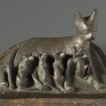 Sculpture of a cat with kittens